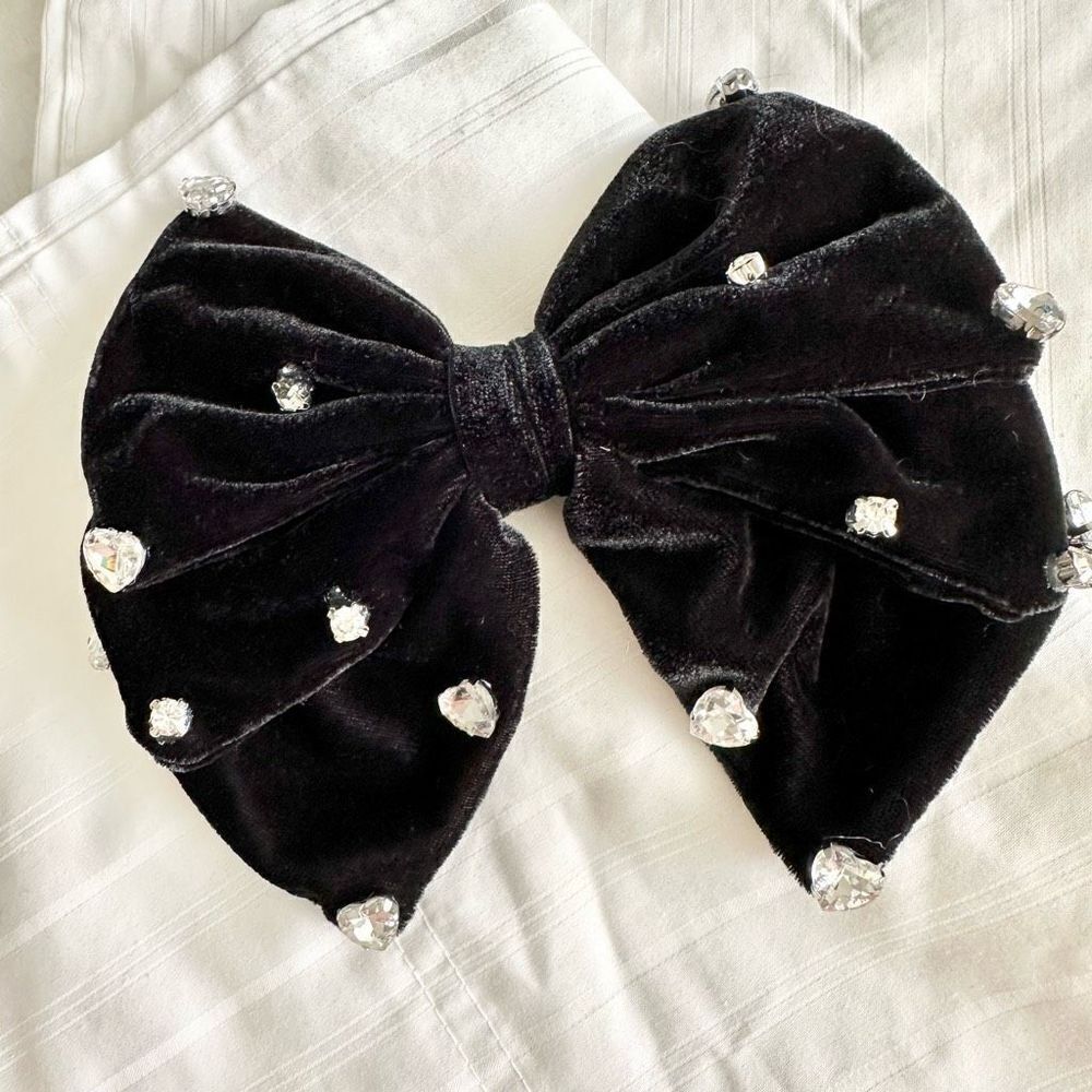 Black velvet bow with heart rhinestones